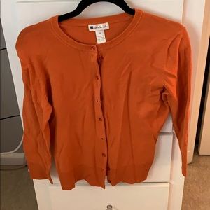Valerie Bertinelli orange cardigan